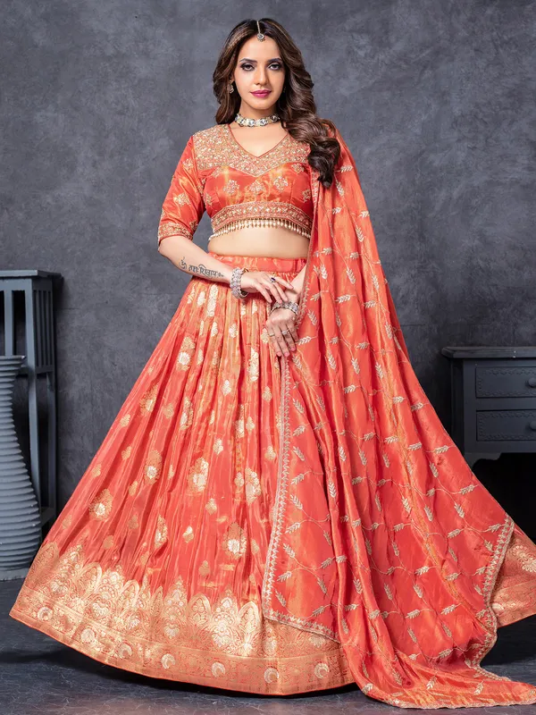 Orange silk sequins worked lehenga choli