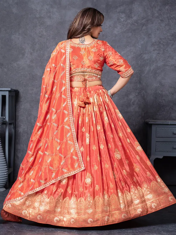 Orange silk sequins worked lehenga choli