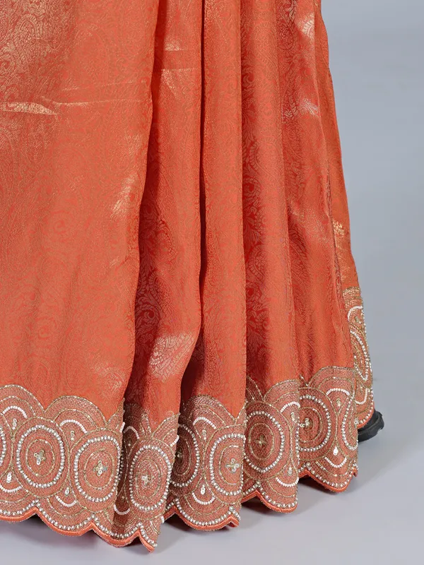 Orange tissue silk festive saree