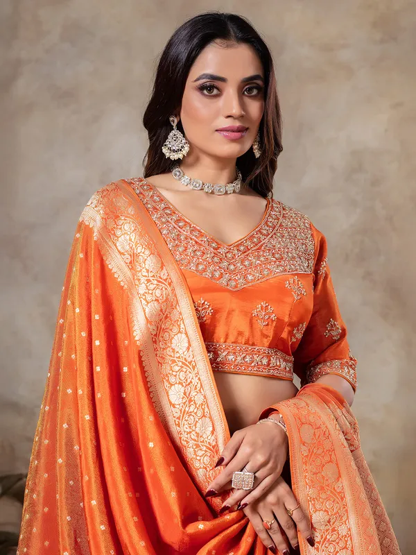 Orange tissue silk saree in zari weaving