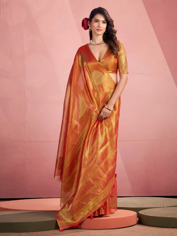 Orange tissue silk saree with zari work