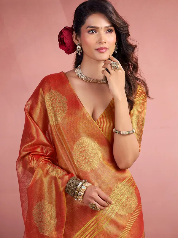 Orange tissue silk saree with zari work