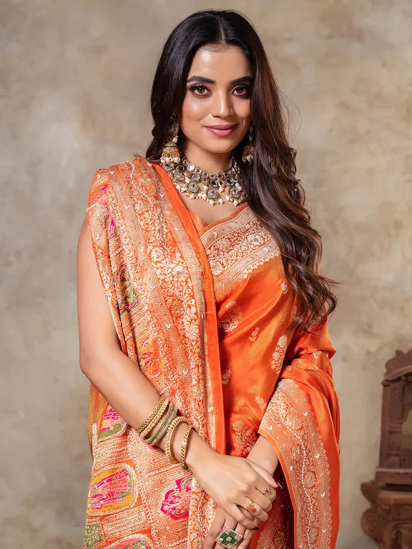 Orange tissue silk zari weaving saree