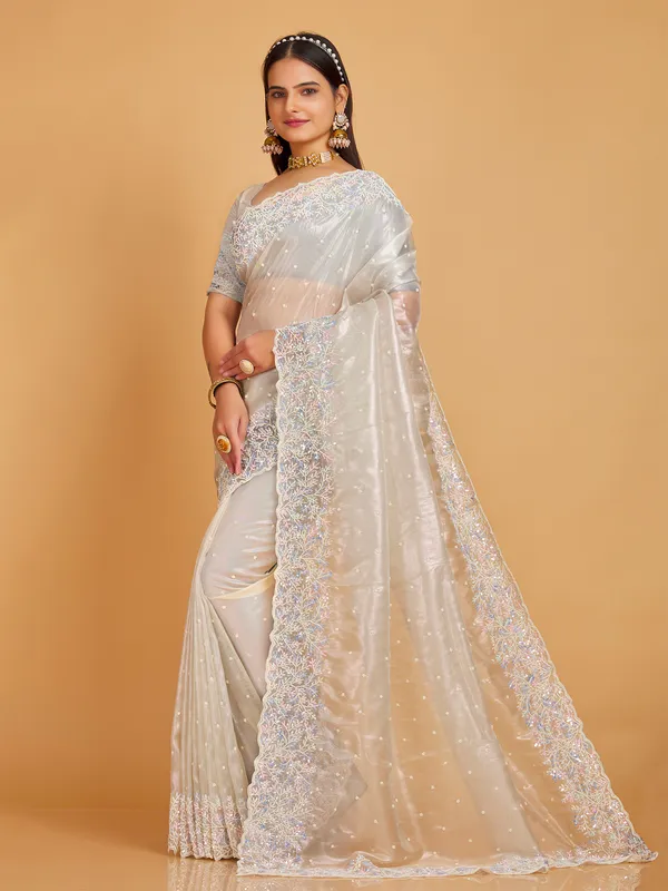 Organza cream wedding wear saree