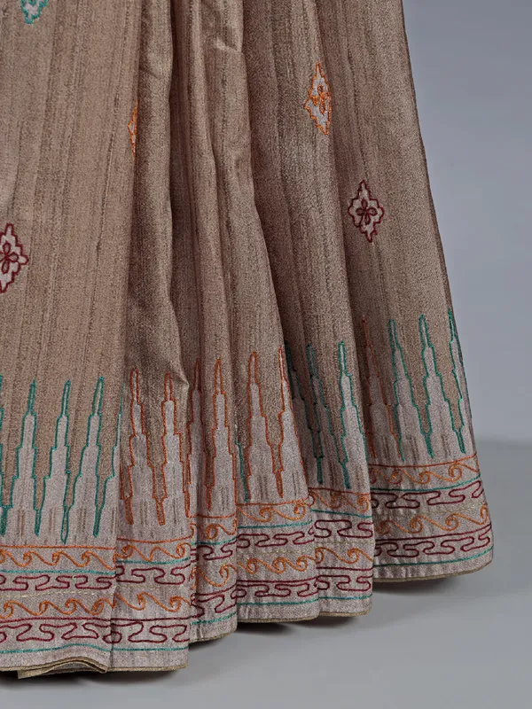 Pastel beige silk saree with intricate thread detailing