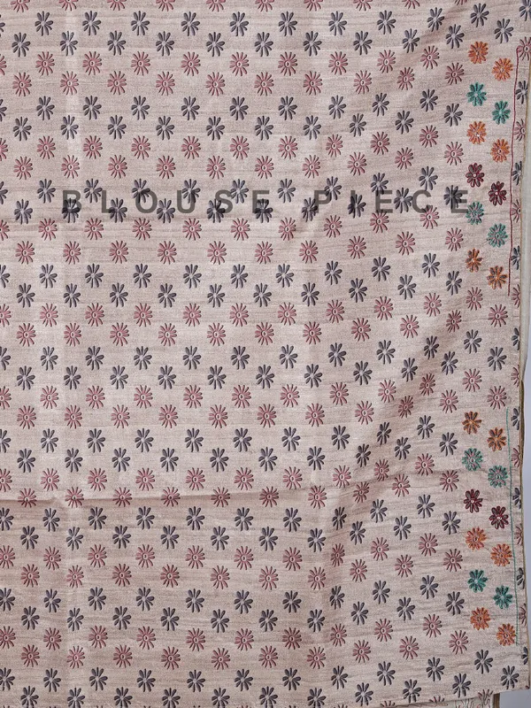 Pastel beige silk saree with intricate thread detailing