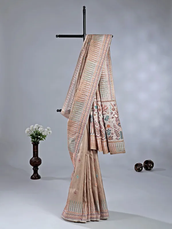 Pastel beige silk saree with intricate thread detailing