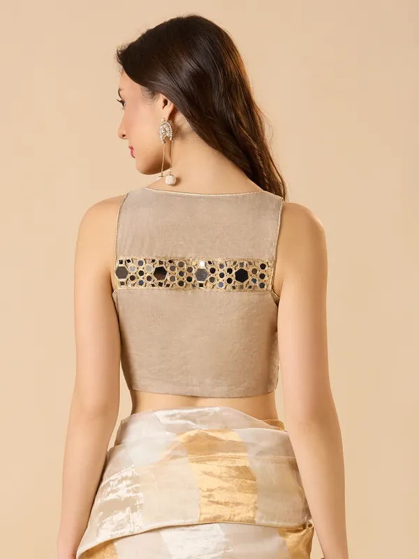 Pastel beige tissue silk solid sleeveless ready made blouse