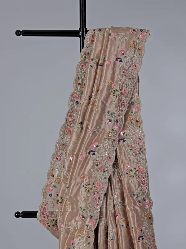 Pastel beige tissue silk wedding wear saree