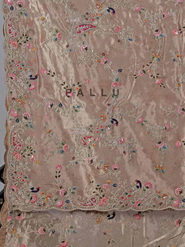 Pastel beige tissue silk wedding wear saree