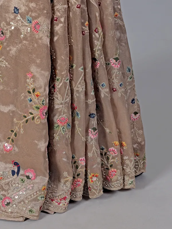 Pastel beige tissue silk wedding wear saree