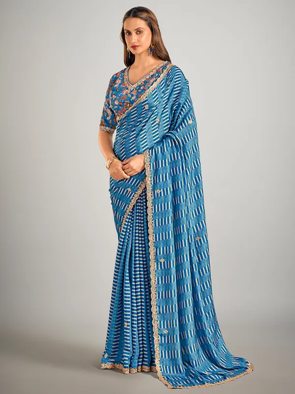 Pastel blue printed crepe silk saree