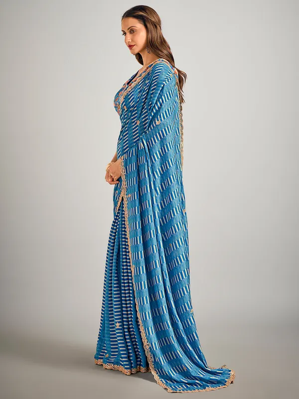 Pastel blue printed crepe silk saree