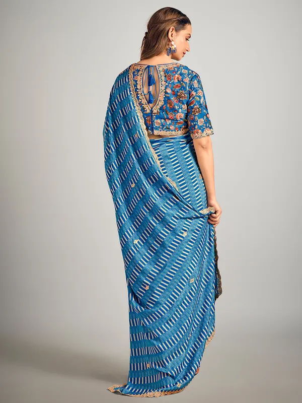 Pastel blue printed crepe silk saree