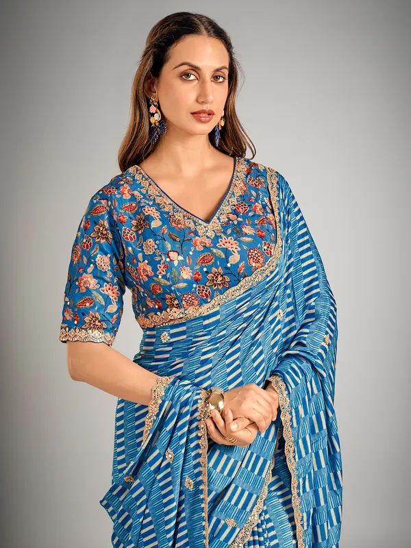 Pastel blue printed crepe silk saree