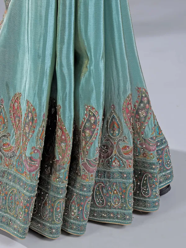 Pastel blue silk saree with timeless zari weaving