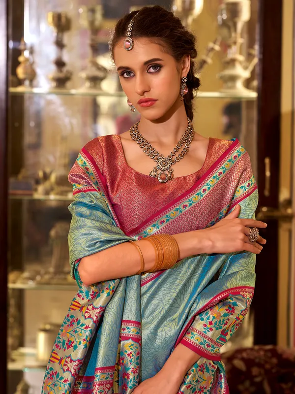 Pastel blue tissue silk saree in zari weaving
