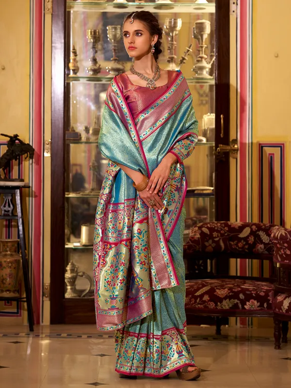 Pastel blue tissue silk saree in zari weaving