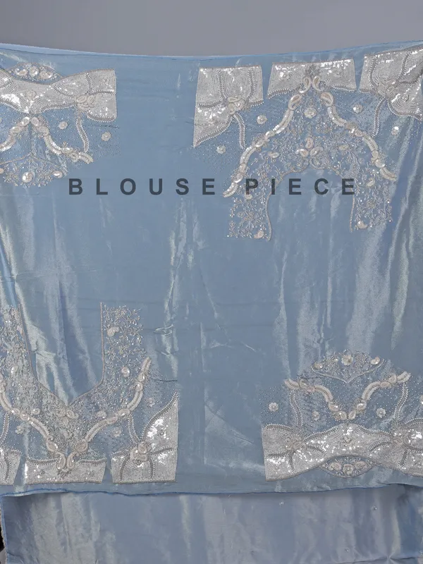 Pastel blue tissue silk saree with classic sequins work
