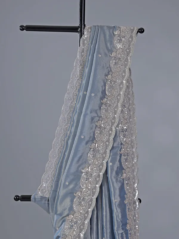 Pastel blue tissue silk saree with classic sequins work