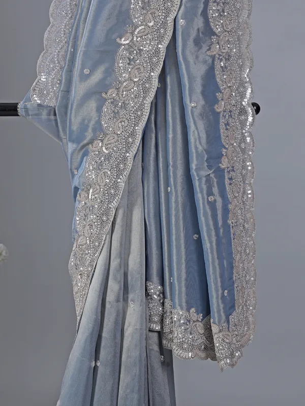 Pastel blue tissue silk saree with classic sequins work