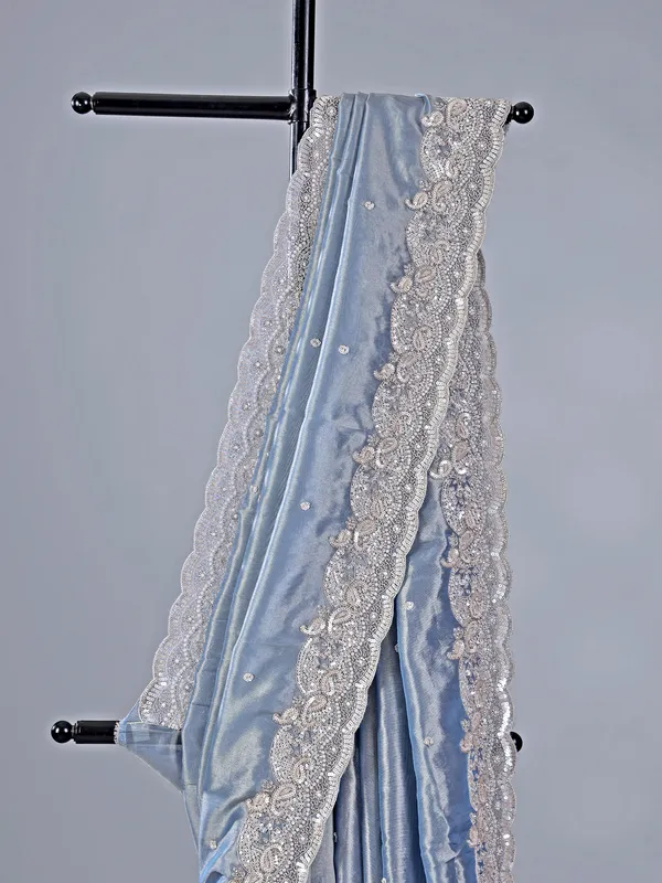 Pastel blue tissue silk saree with classic sequins work
