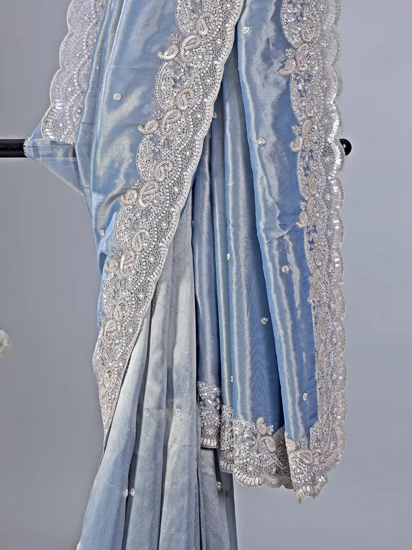 Pastel blue tissue silk saree with classic sequins work