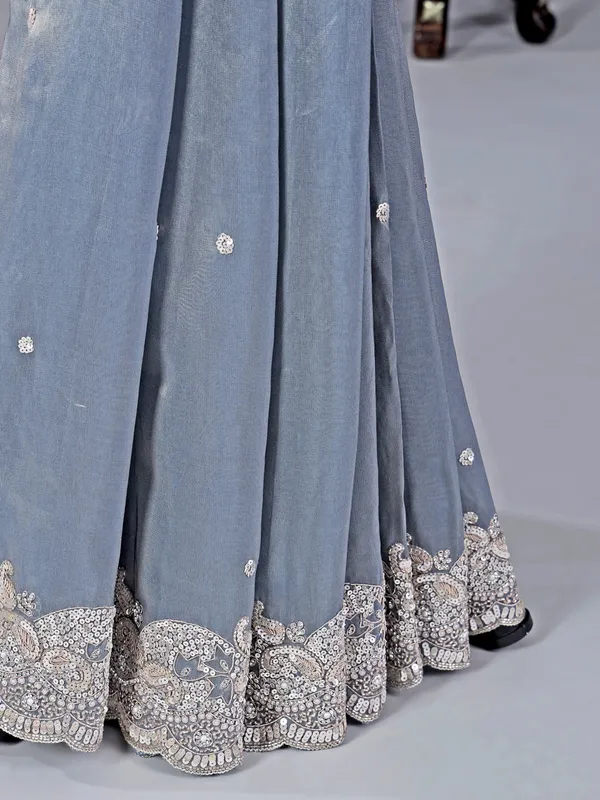Pastel blue tissue silk saree with classic sequins work