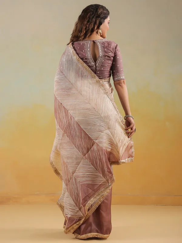 Pastel brown printed wedding style tusser silk saree