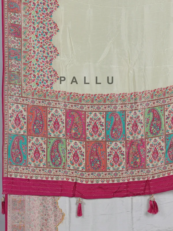 Pastel cream pashmina silk saree with artistic borders