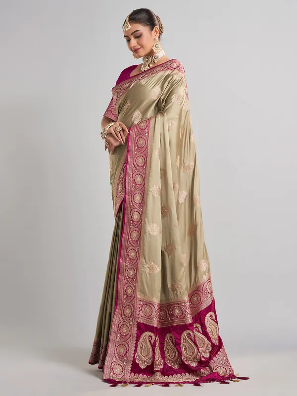 Pastel green and rani pink satin silk saree for wedding celebrations