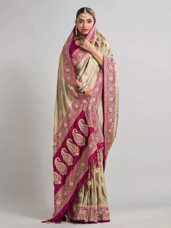 Pastel green and rani pink satin silk saree for wedding celebrations