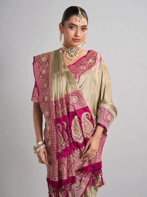Pastel green and rani pink satin silk saree for wedding celebrations