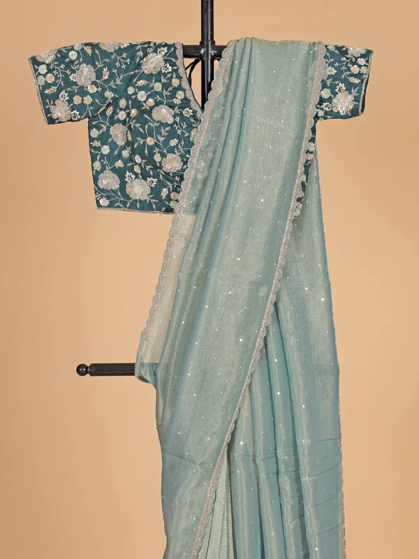 Pastel green organza wedding wear saree