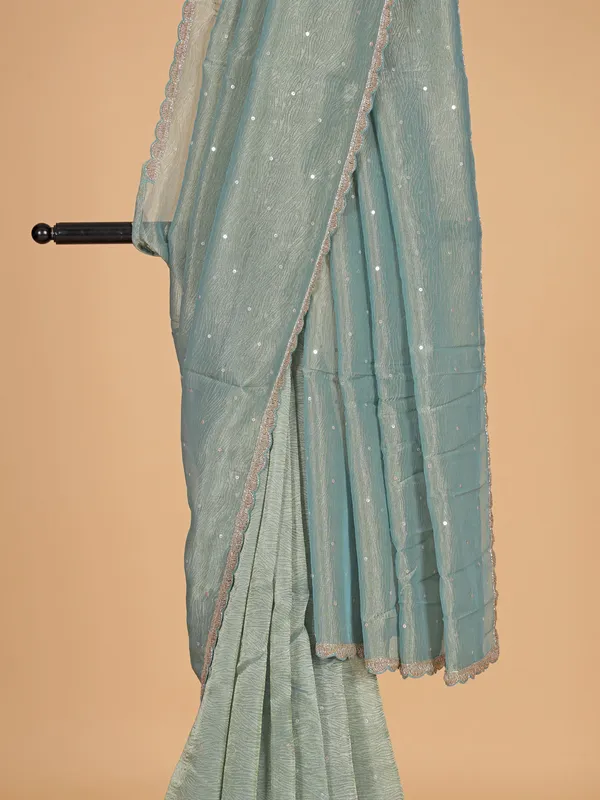 Pastel green organza wedding wear saree