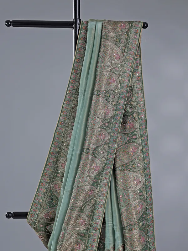 Pastel green silk saree with zari work for wedding wear