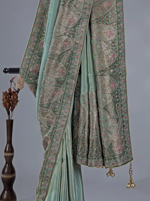 Pastel green silk saree with zari work for wedding wear