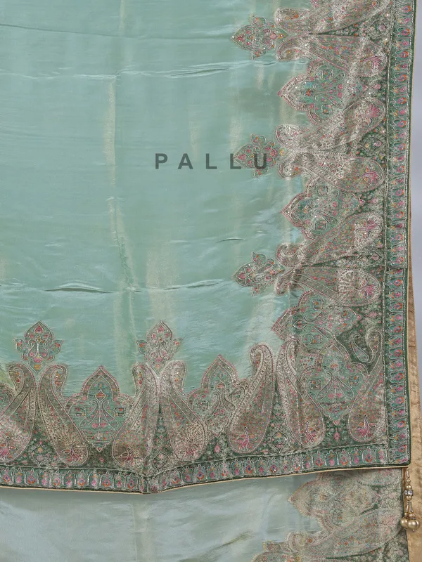 Pastel green silk saree with zari work for wedding wear