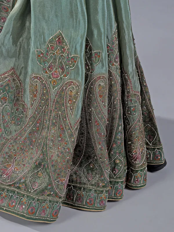 Pastel green silk saree with zari work for wedding wear