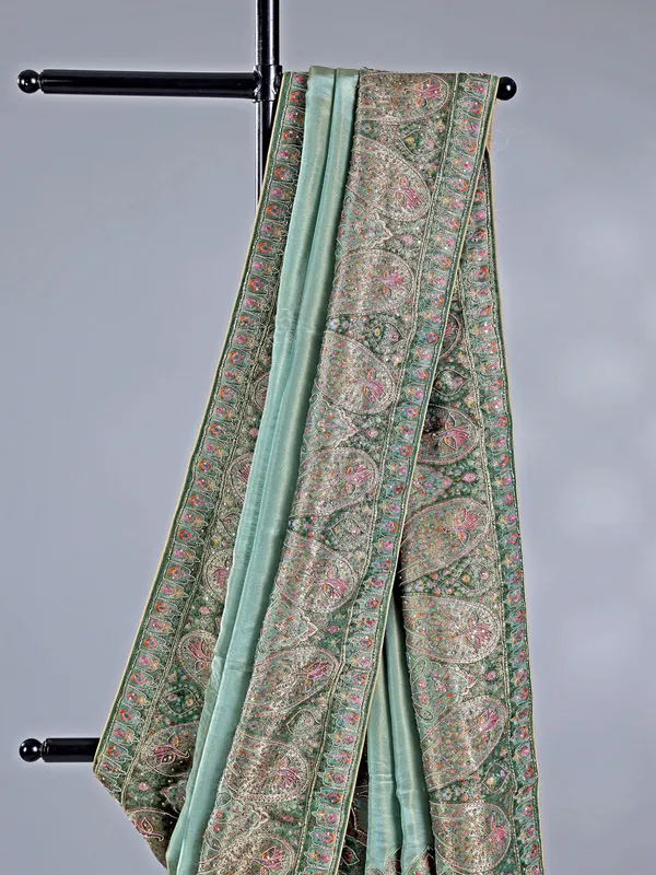 Pastel green silk saree with zari work for wedding wear