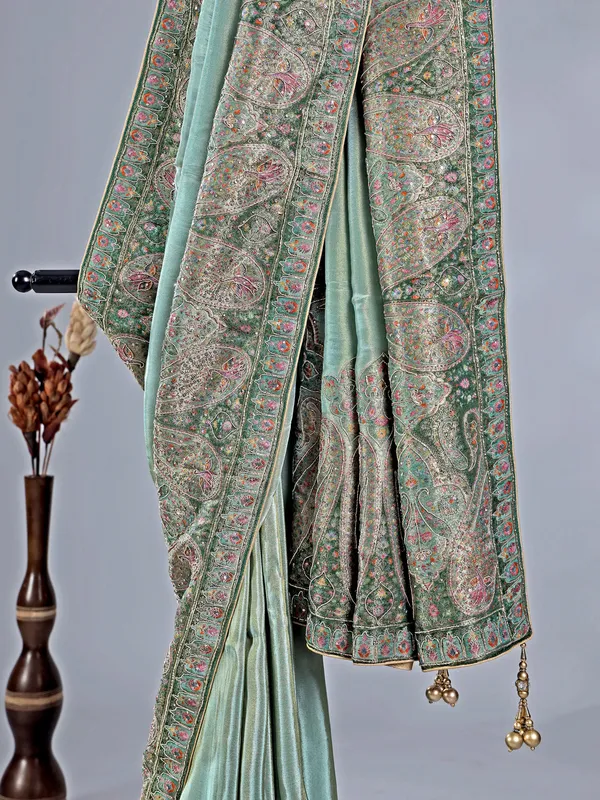 Pastel green silk saree with zari work for wedding wear
