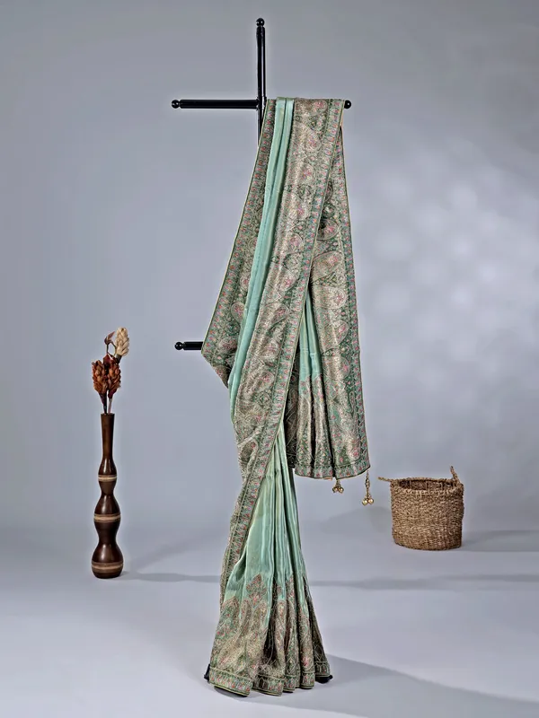 Pastel green silk saree with zari work for wedding wear