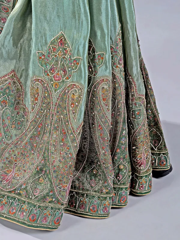 Pastel green silk saree with zari work for wedding wear