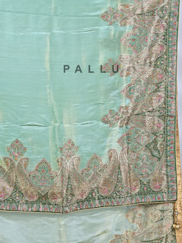 Pastel green silk saree with zari work for wedding wear