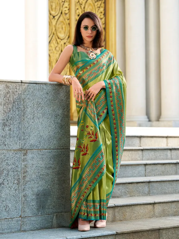 Pastel green tissue silk zari weaving saree