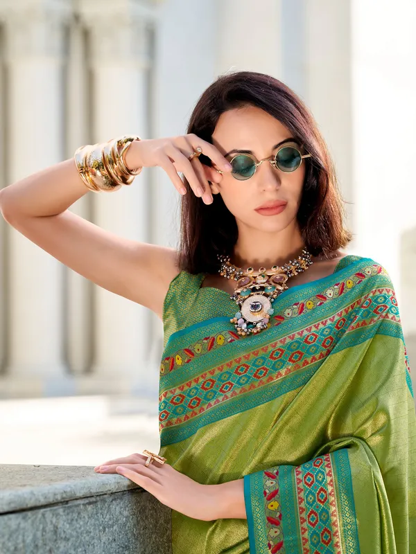 Pastel green tissue silk zari weaving saree