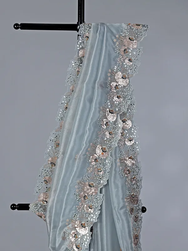 Pastel grey tissue silk saree for wedding wear