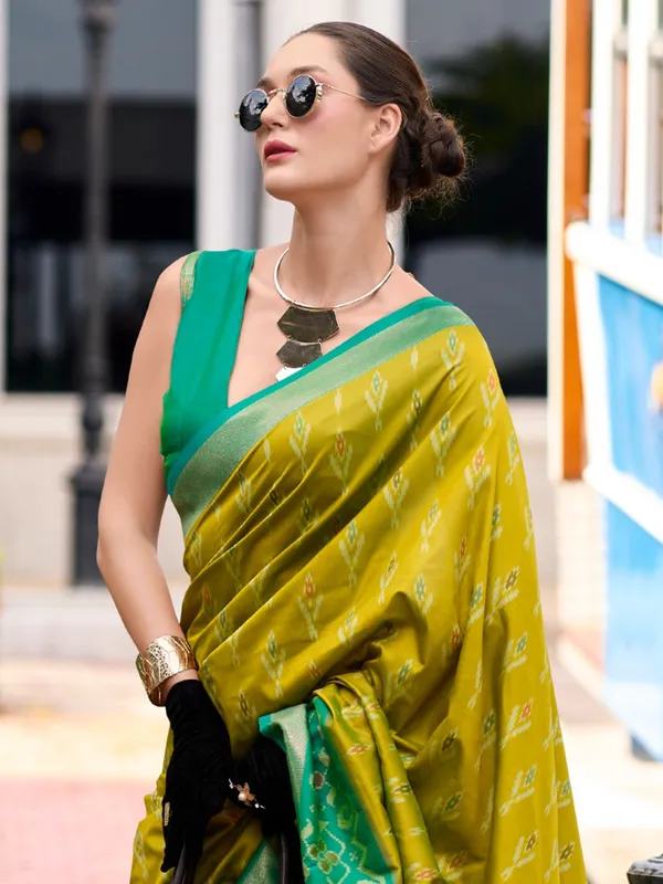 Pastel olive saree with contrast border