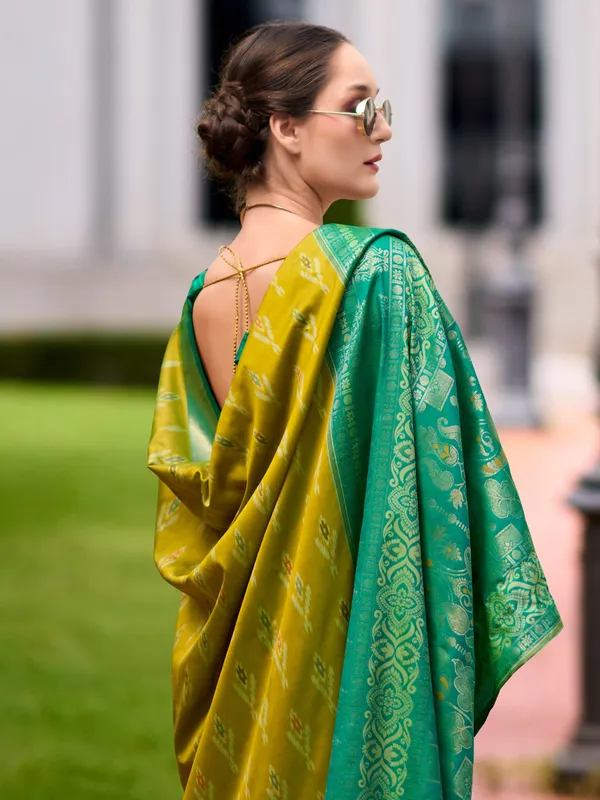 Pastel olive saree with contrast border