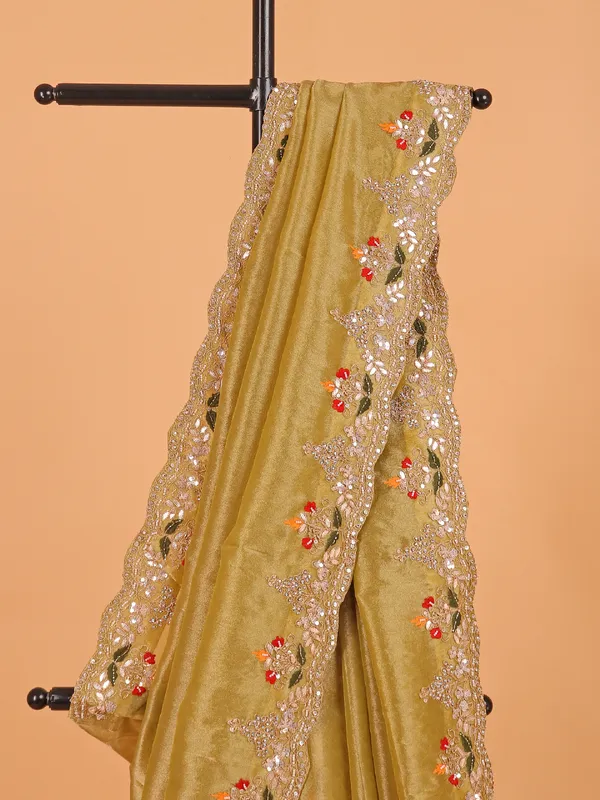 Pastel olive shimmer tissue silk saree for wedding